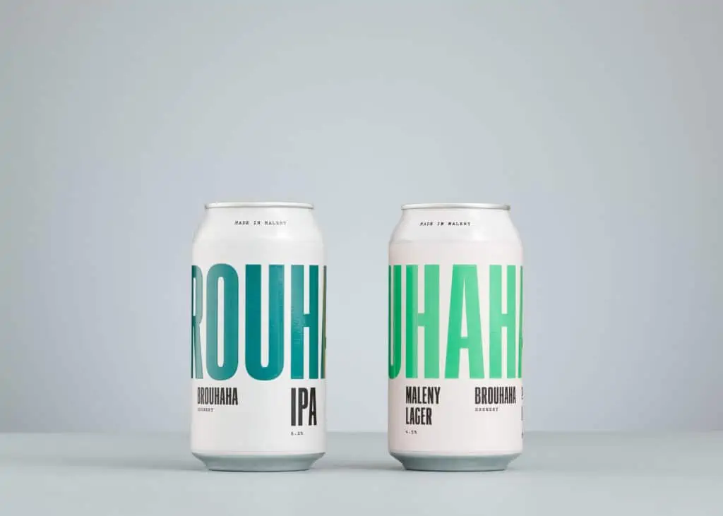 Two beer cans with customer label printing by Ultra Labels.